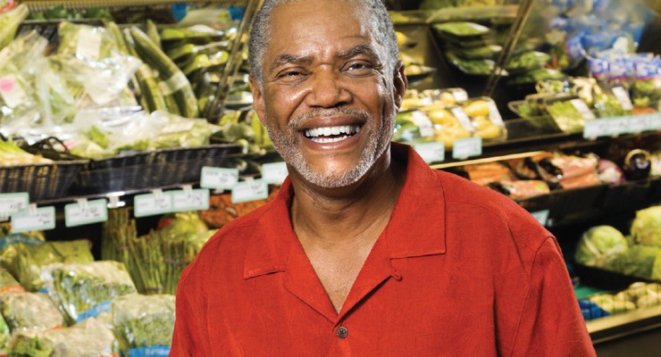 smiling man in grocery store